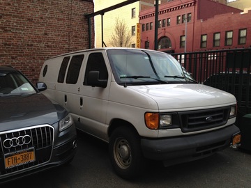Rent: Ford E-150 Cargo van with shelves