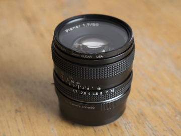 Rent: Zeiss C/Y 50mm Planar f1.7 (w/UV Filter + m43 Adapter)