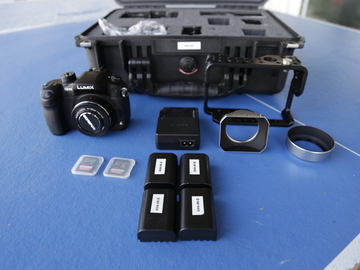 Panasonic GH4 + Olympus 12-42mm lens + 5 Batteries + Package